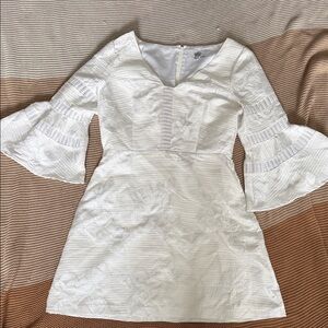 Elegant White Flared Sleeve Dress